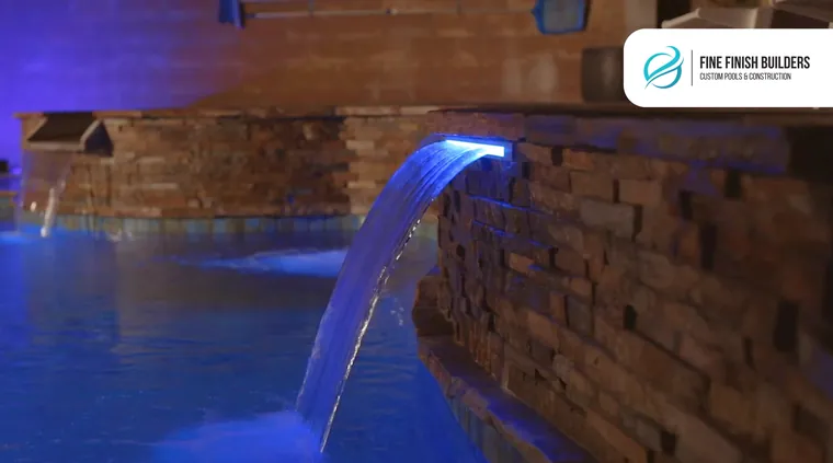 Custom pool water feature by Fine Finish Builders